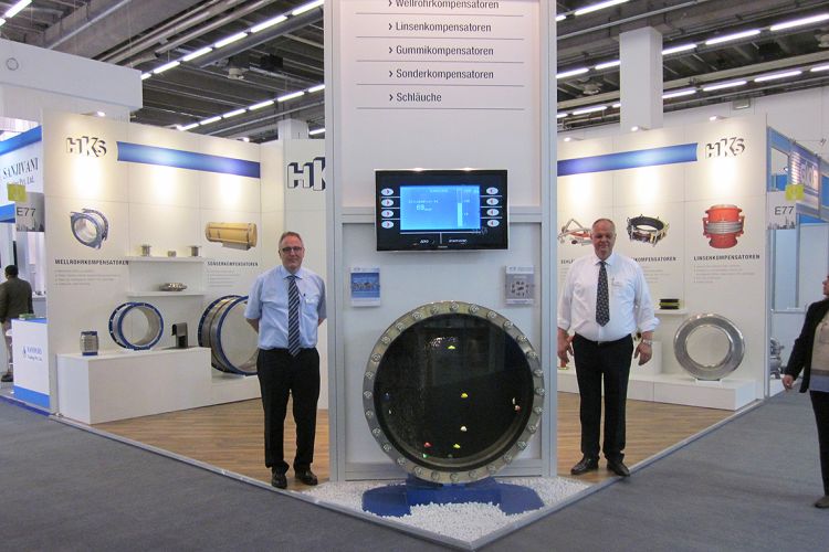 HKS exhibition stand at the Achema trade fair with two sales employees